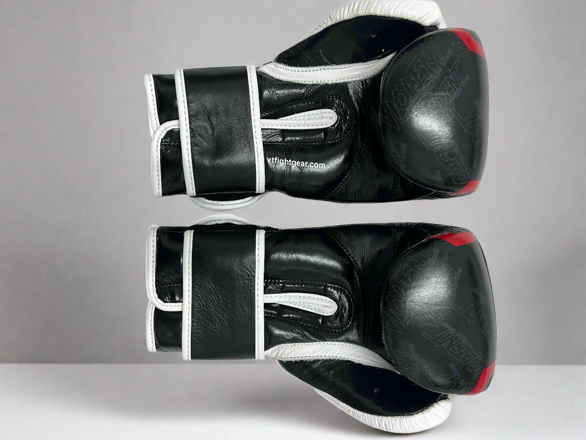 Pair of black boxing gloves on a white background