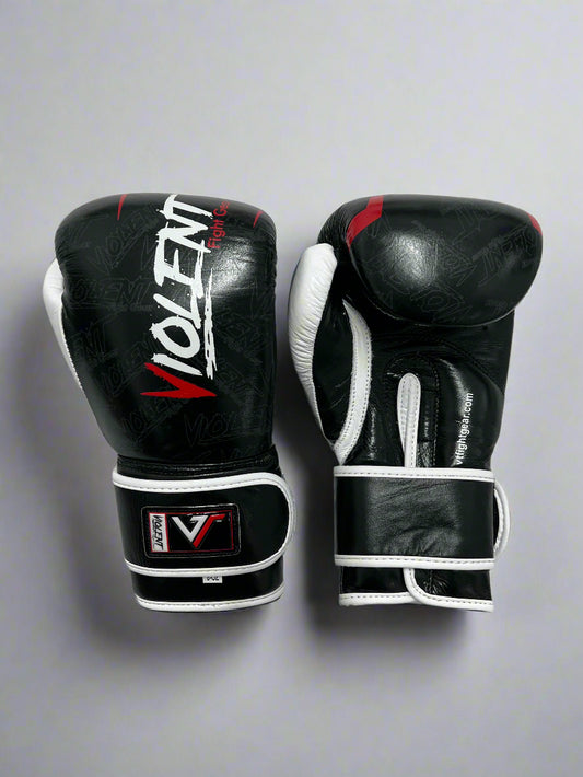 Pair of black boxing gloves with visible branding on a white background